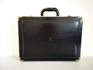 Doctor medical case with supplies on a table