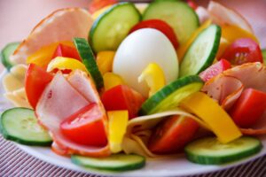 Colorful healthy salad with fresh vegetables on a table